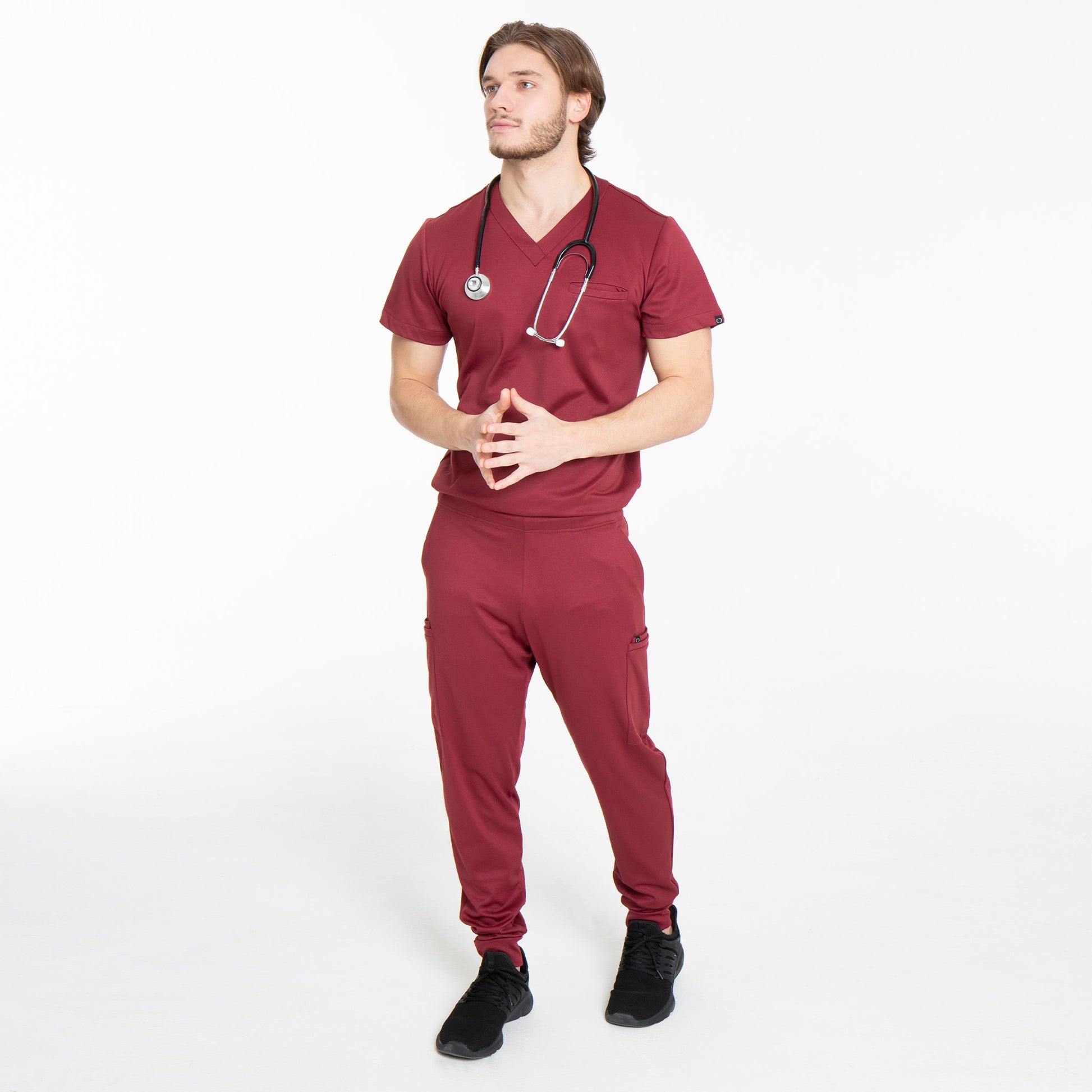 Full body view of men's Argon scrub top in burgundy